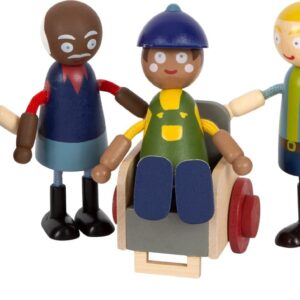 Famille de poupées souples avec fauteuil roulant